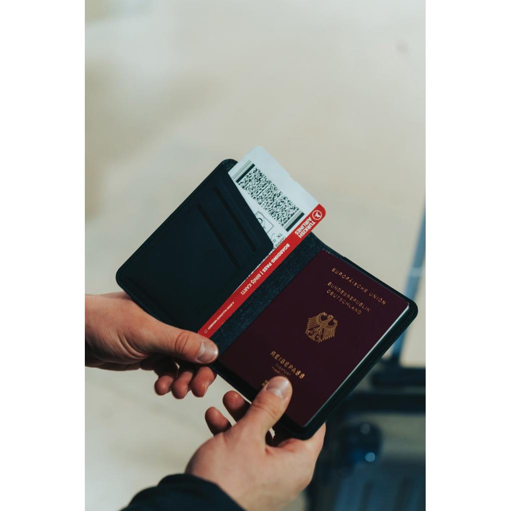 Trackmate RCS rpolyester passport holder worldwide locating black
